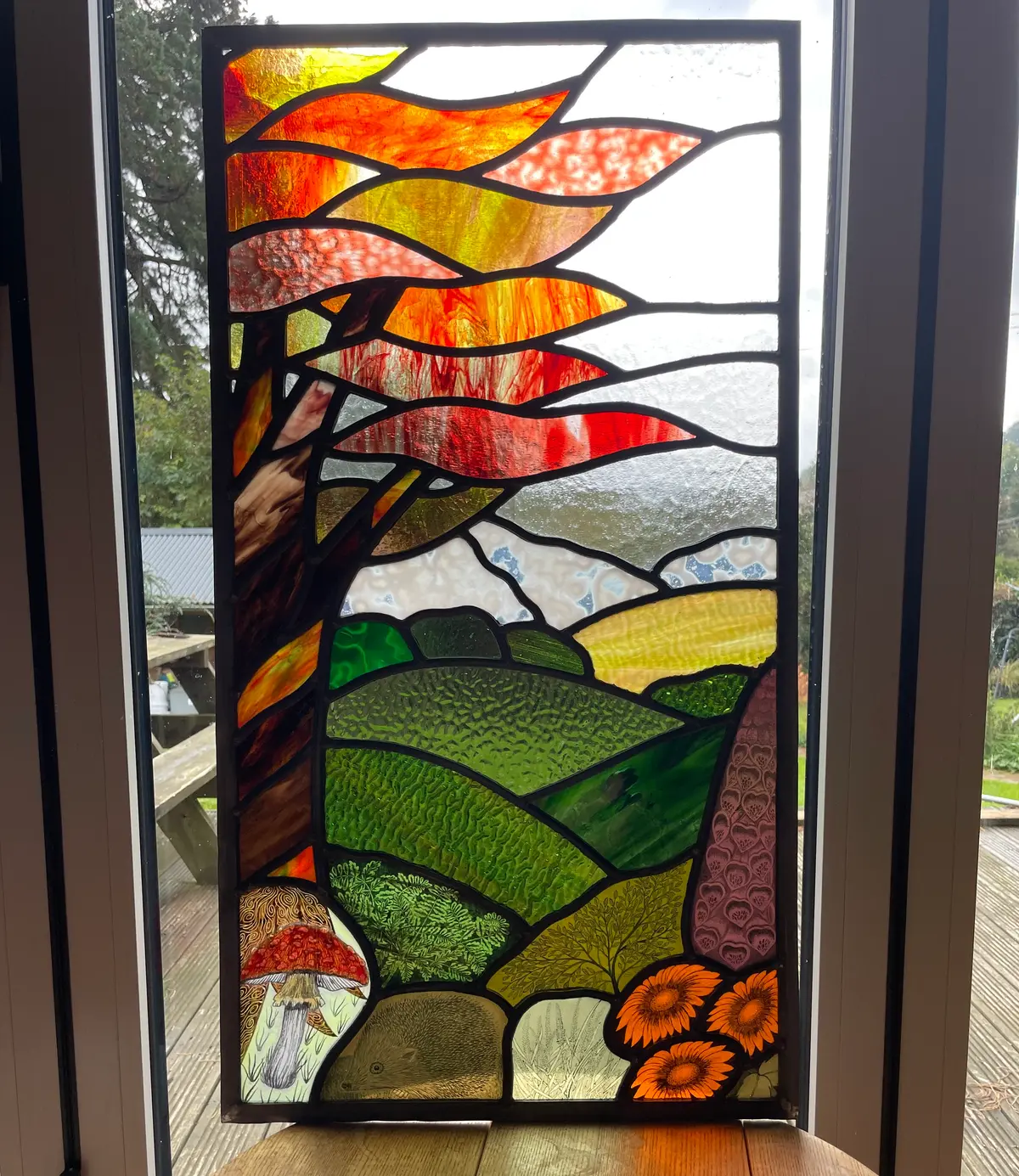 Three sizes of red fused glass electric lamps