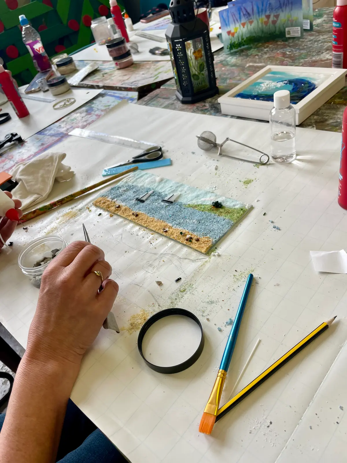 Glass and tools on a studio workbench